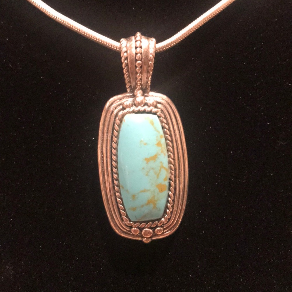 Sterling silver pendant only.